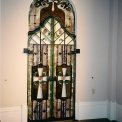Our Lady of Lourdes Adoration Chapel - These entry doors and arch-topped overhead Stained Glass adorn the entrance to the beautiful, century old rose stone church and historical site of Our Lady of Lourdes located in Dobie, Wisconsin.