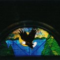 Bald Eagle Beauty - The beauty of this half-moon window is displayed in the breath-taking art glass used, known as Uroboros.  The intricate features of the American Bald Eagle is totally gorgeous.  Commissioned by friends in their private get-away cabin located near Loch Lomand Resort and Beach Club near Birchwood, WI.